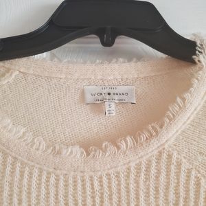 Lucky brand light color peach sweater.